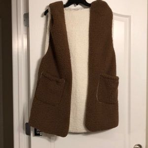 Reversible vest with hood